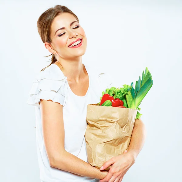 Mujer con comida vegana en bolsa —  Fotos de Stock