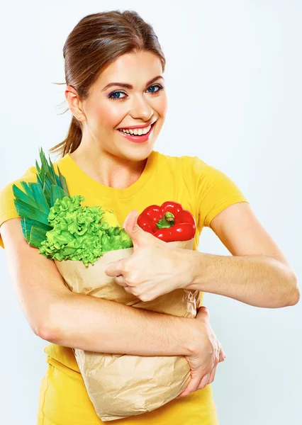 Sorrindo mulher segurar comida verde . — Fotografia de Stock