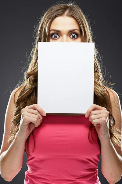 Woman hiding behind blank board — Stock Photo, Image