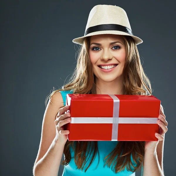 Girl holds red gift box — Stock Photo, Image