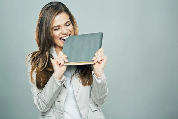 Businesswoman bookkeeper biting book — Stock Photo, Image