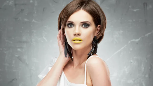 Woman with yellow lips — Stock Photo, Image