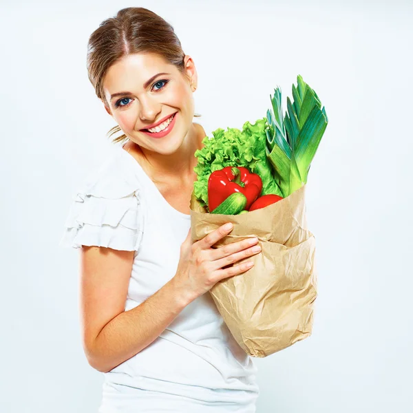 Mujer con comida vegana en bolsa —  Fotos de Stock