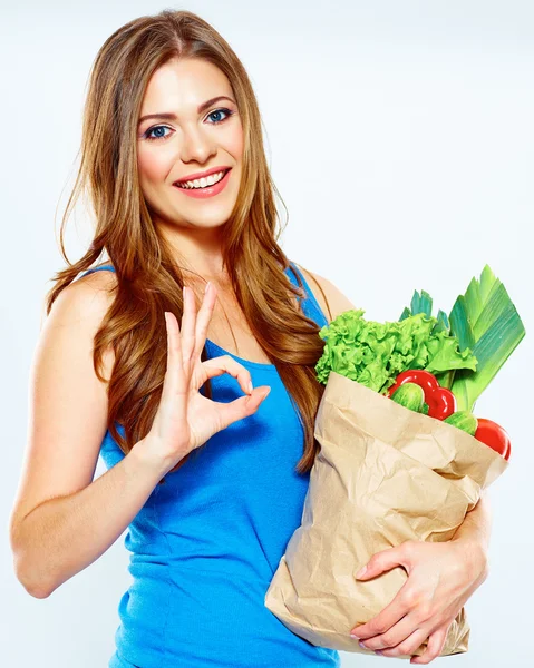 Mulher segura saco com legumes — Fotografia de Stock