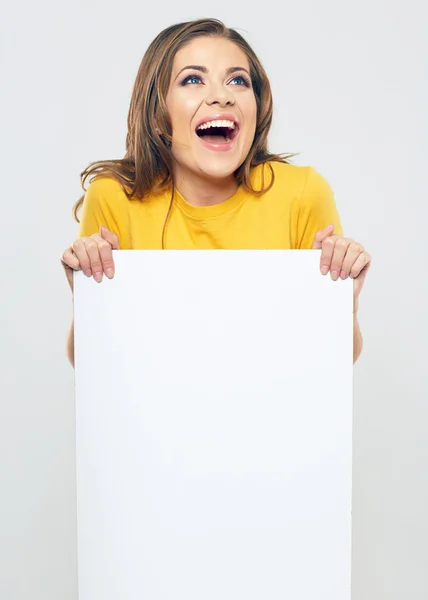 Woman holding blank poster — Stock Photo, Image