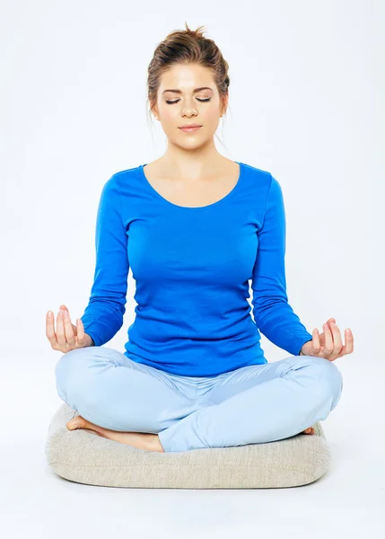 Woman sitting in yoga pose — Stock Photo, Image