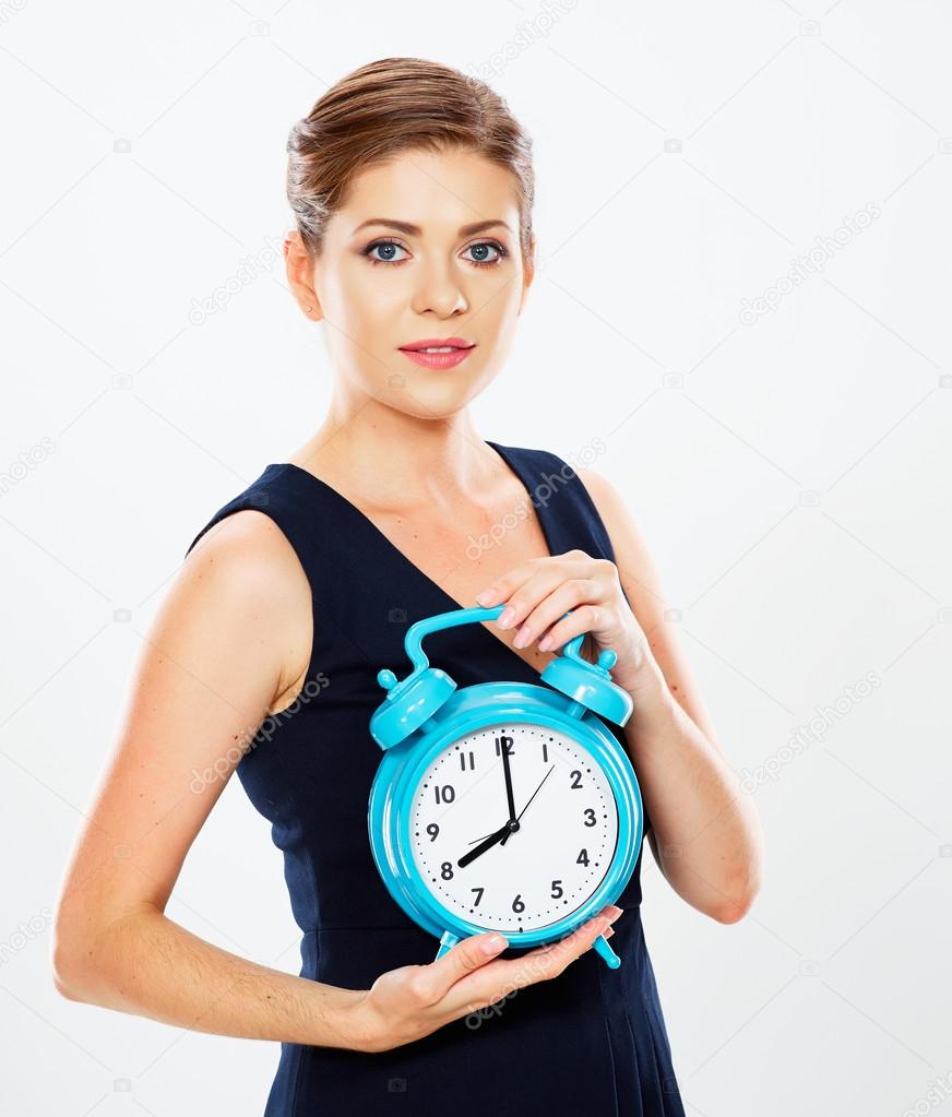 Businesswoman holds watch