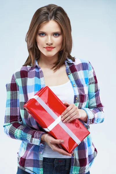 Woman holds red gift box — Stock Photo, Image