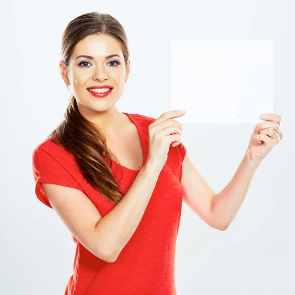 Mujer sostiene blanco papel en blanco — Foto de Stock