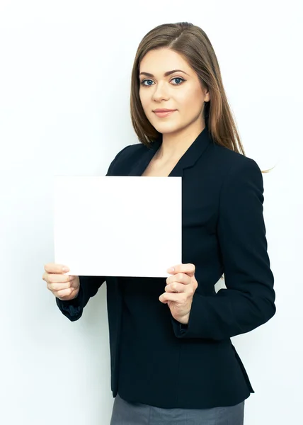 Affärskvinna visar tecken styrelse — Stockfoto