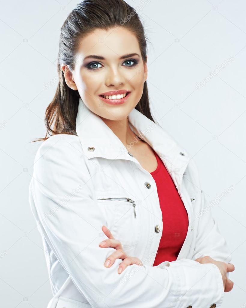 Woman posing in white jacket