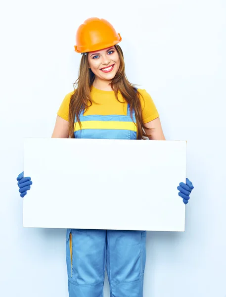 Kvinnlig builder anläggning stora ombord — Stockfoto