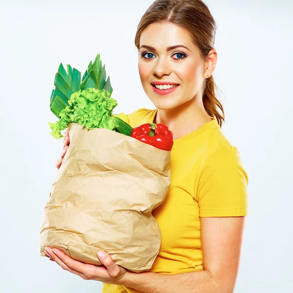 Mulher com comida vegan no saco — Fotografia de Stock