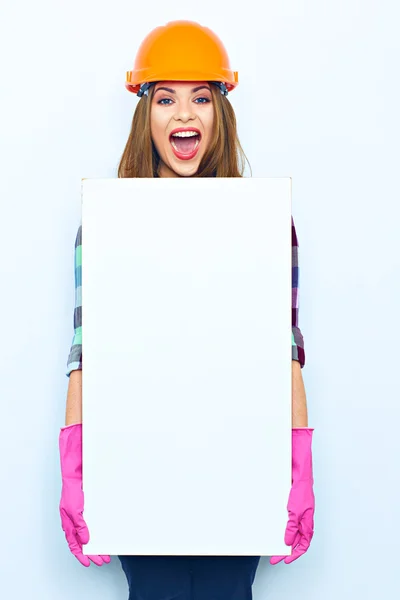 Female builder holding big board — Stock Photo, Image