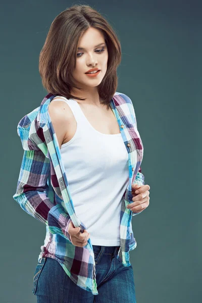 Woman posing in checkered shirt — Stock Photo, Image