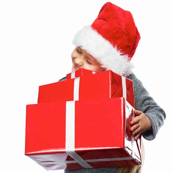 Girl holds christmas gifts — Stock Photo, Image