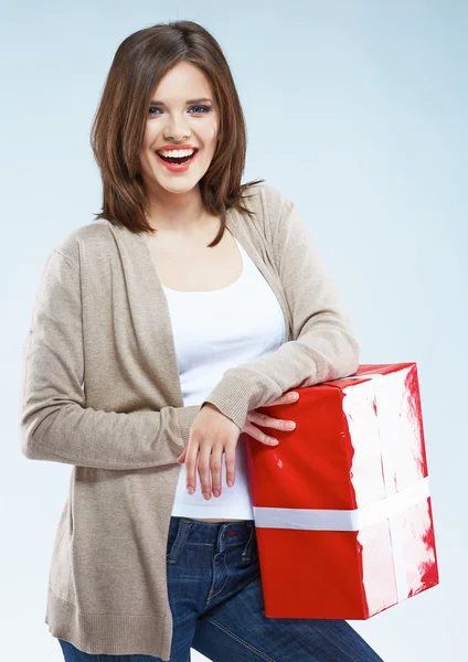 Happy woman holds gift box — Stock Photo, Image