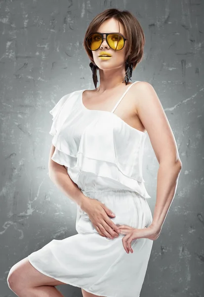 Model with yellow sunglasses