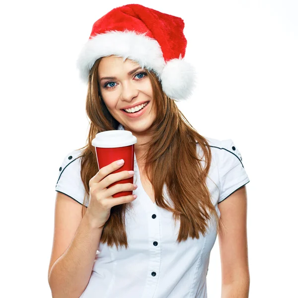 Vrouw in kerstmuts met een koffiekopje — Stockfoto