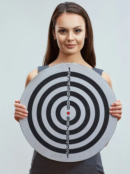 Business woman holds darts target — Stock Photo, Image