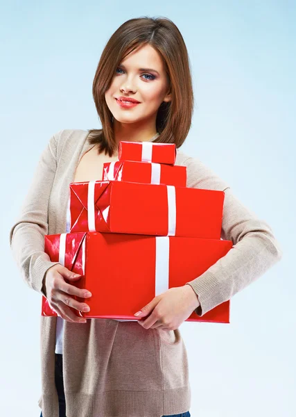 Woman holds red gift boxes — Stock Photo, Image