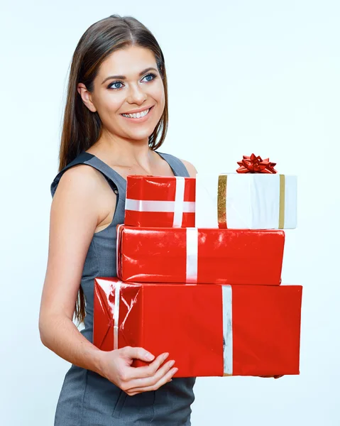 Businesswoman holds gifts — Stock Photo, Image