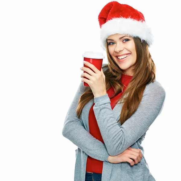 Kobieta w kapeluszu Santa z filiżanki kawy — Zdjęcie stockowe