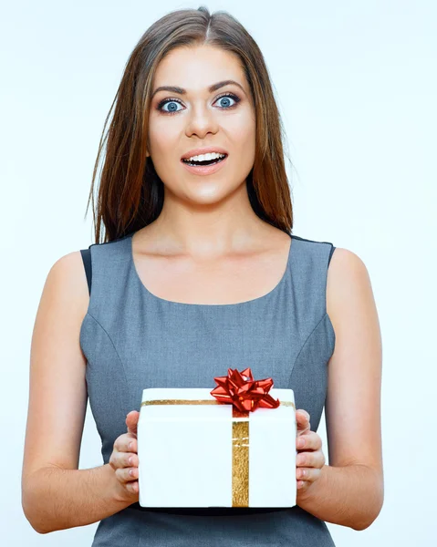 Businesswoman holds gift — Stock Photo, Image