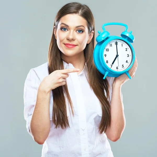 Businesswoman holds alarm clock — Stock Photo, Image