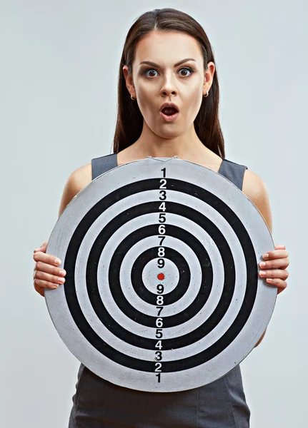 Business woman holds darts target — Stock Photo, Image