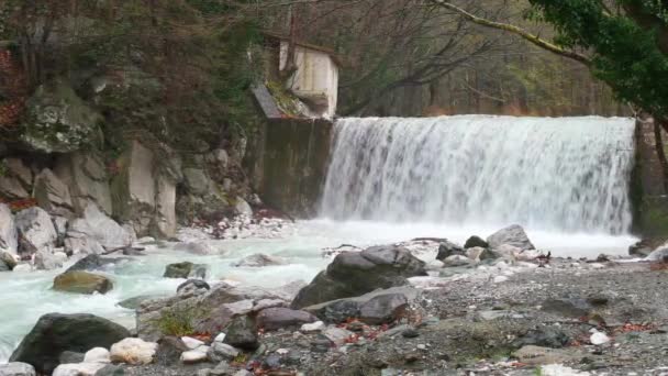 Artificial waterfall on the river  Termopotamos. 4K — Stock Video