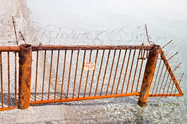 Fence on a beach — Stock Photo, Image