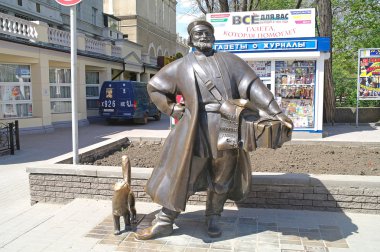 Bir şehir sokak üzerinde neşeli tüccar heykel