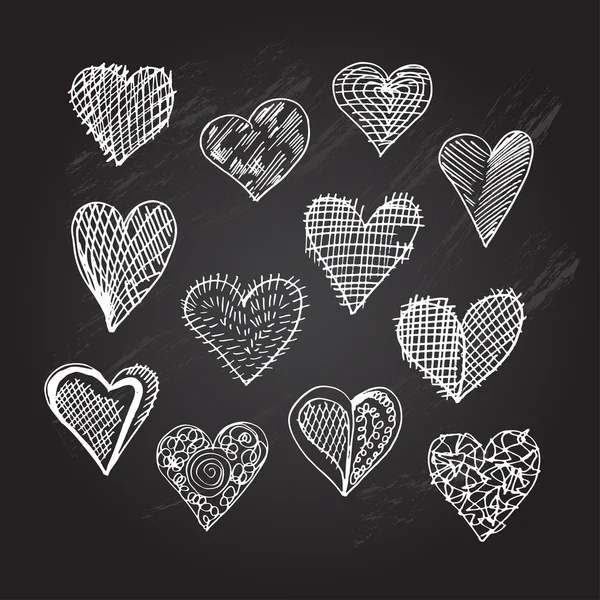 Conjunto de corações desenhados à mão — Vetor de Stock