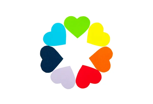 Círculo de corações de papel cores do arco-íris isolado no fundo branco. Fotos De Bancos De Imagens