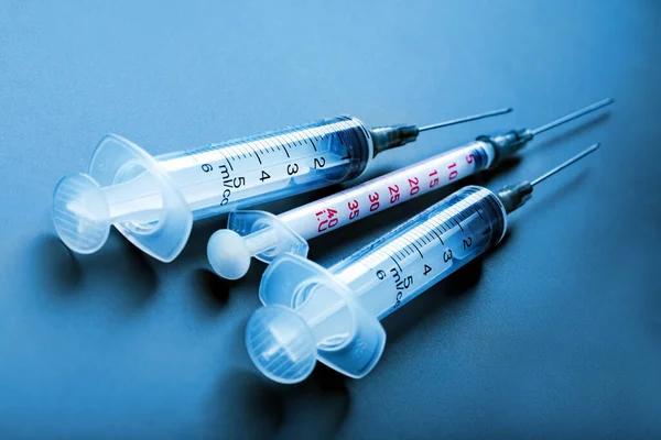 Three medical syringes. Coronavirus, Covid-19 vaccination — Zdjęcie stockowe