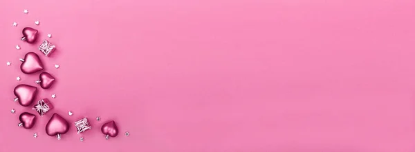 Valentinstag Banner mit Herzen, Sternen und Geschenkschachteln auf rosa Hintergrund. lizenzfreie Stockbilder