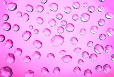 Pembe arkaplanda su damlalarını kapat