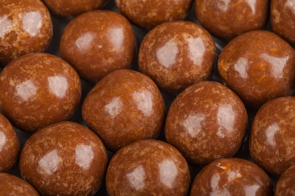 Sluiten van chocolade snoepballen. Suikerwerk textuur achtergrond Rechtenvrije Stockafbeeldingen