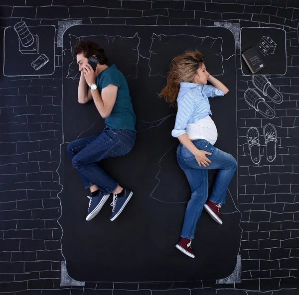 Young family having fun in a bedroom — Stock Photo, Image