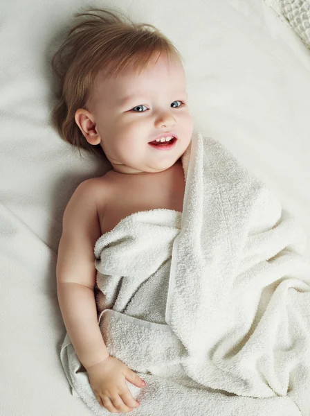 Baby with towels — Stock Photo, Image