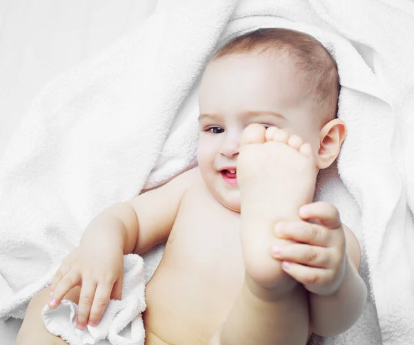 Baby with a towel — Stock Photo, Image