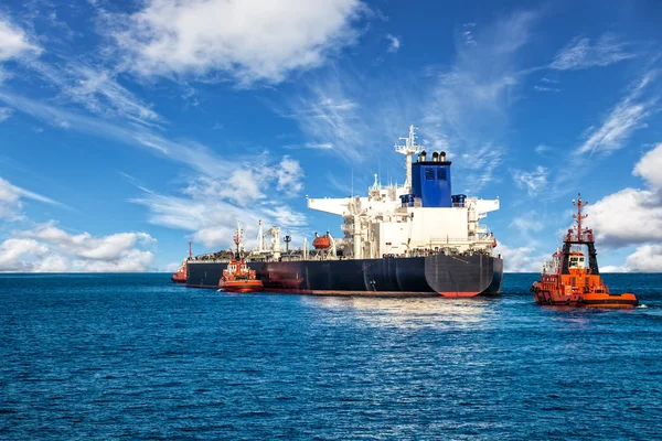 Ship with Tugboats — Stock Photo, Image