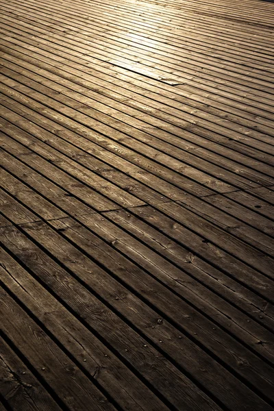 Wooden planks in early morning light — Stock Photo, Image