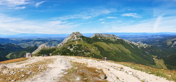 Turisté v horách — Stock fotografie