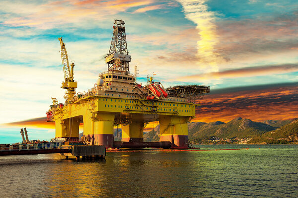 Oil platform at sunset
