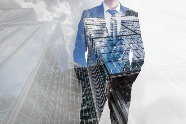 Double exposure of businessman and skyscrapers — Stock Photo, Image