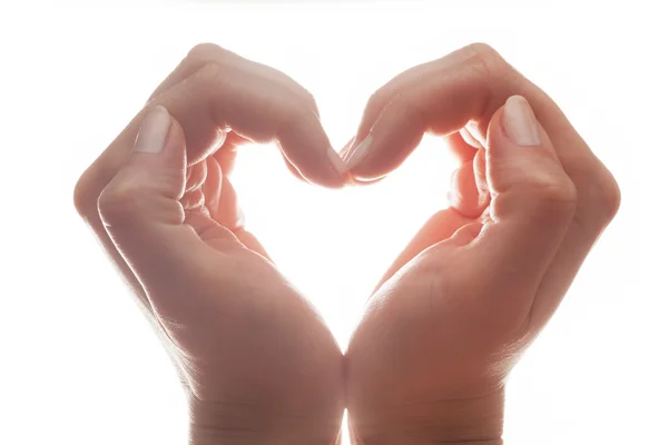 Ręce kobiety zrobić kształt serca — Zdjęcie stockowe