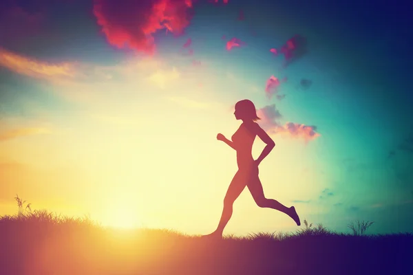 Mujer corriendo al atardecer — Foto de Stock