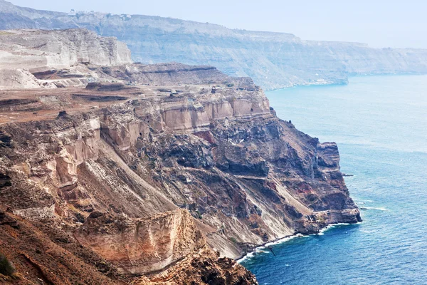 Cliff and volcanic rocks — Stock Photo, Image